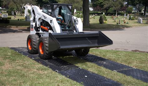 tarp to drive skid steer|skid steer ground protection mats.